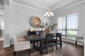 Dining area looking towards Office on right and front door in middle