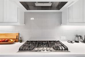 Kitchen island with quartz countertops and electrical outlets