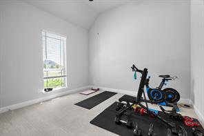 4th Bedroom, currently used as Workout room with lofted ceiling