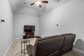 Laundry room with tiled flooring and a window