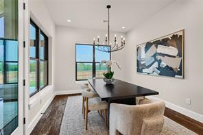 Office features a modern chandelier