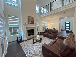 Foyer entrance with dark hardwood / wood-style flooring