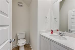 Clothes washing area featuring washer and clothes dryer