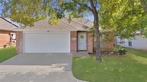 Ranch-style home with a front lawn