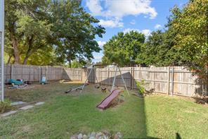 Back of house with a yard, a pergola, central AC unit, and a patio area