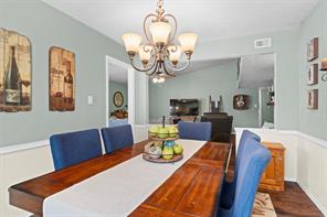 Bedroom with a closet, ceiling fan, and hardwood / wood-style flooring