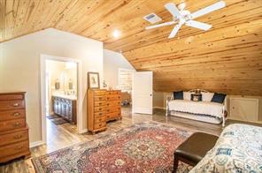 Bathroom with wood ceiling, vanity, hardwood / wood-style floors, and a shower with shower curtain