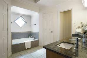 Bathroom featuring crown molding, tile patterned flooring, vanity, and toilet