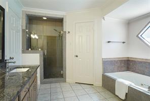 Bedroom with dark hardwood / wood-style flooring and ceiling fan