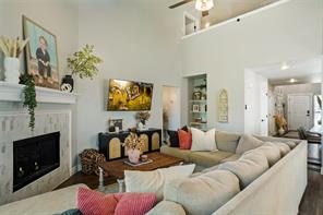 Living room with a high ceiling and sink